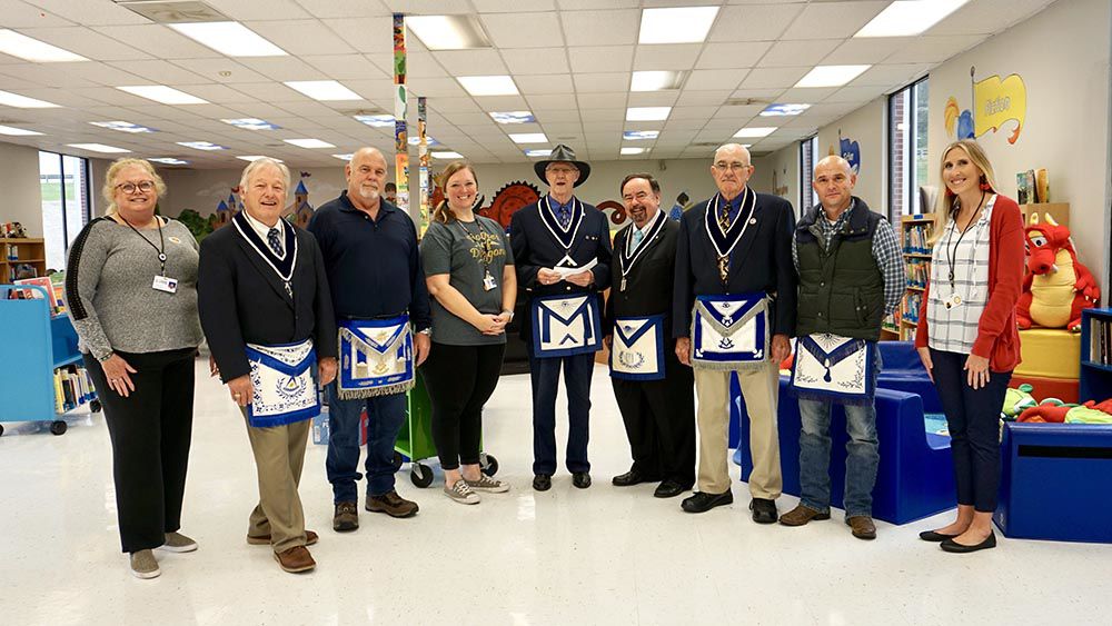 Lindale Masonic Lodge No. 455 gives check to Pepperell Primary School